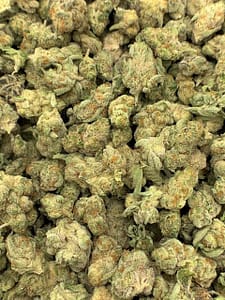 Close-up of Grapes and Cream THCa Flower, highlighting the strain's unique characteristics and trichome structure